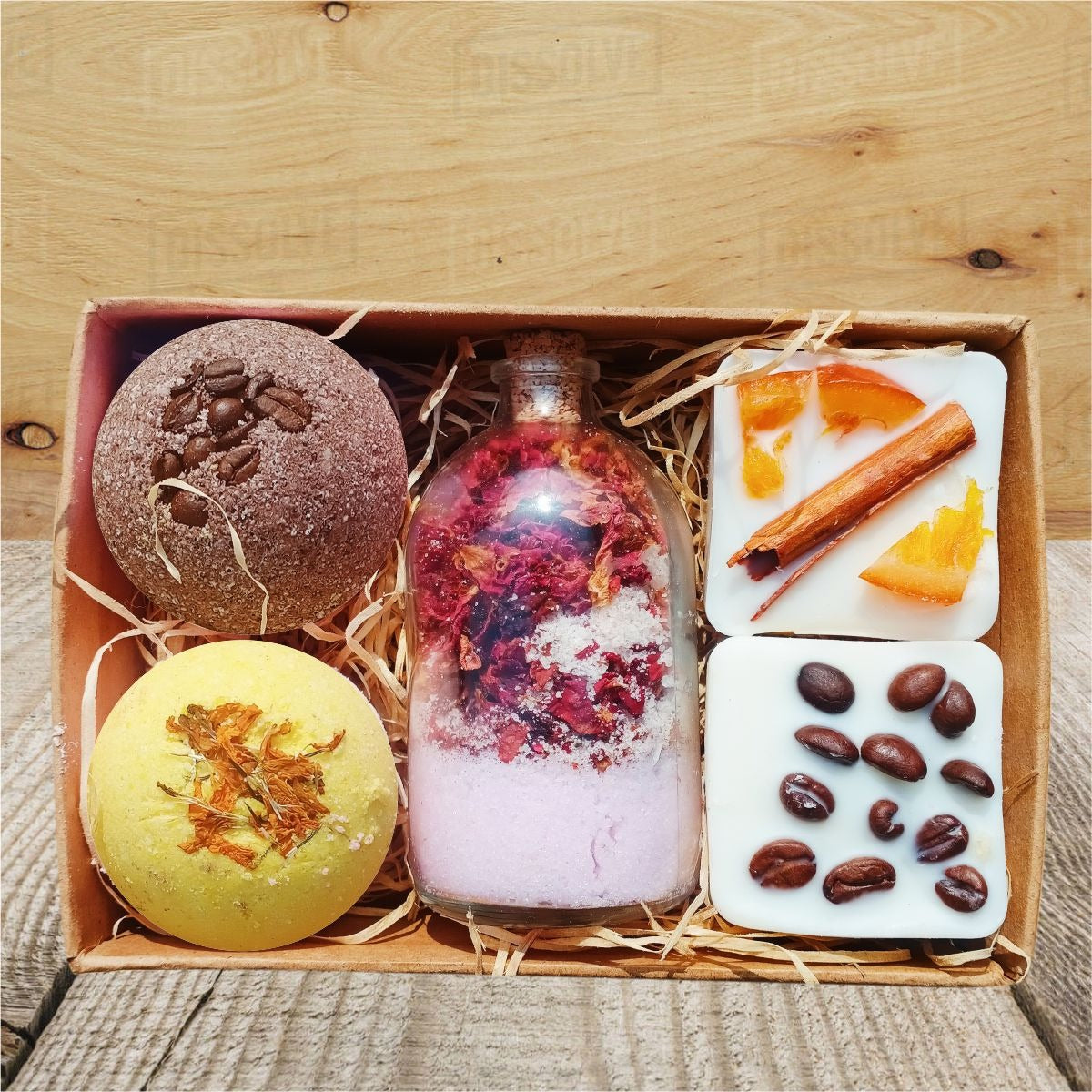 Luxury spa gift set with handmade soaps, bath bombs, and body butter