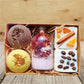 Luxury spa gift set with handmade soaps, bath bombs, and body butter